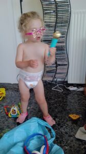 Ava at mine, doing karaoke and singing Ba Ba Black Sheep!