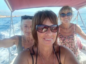 On Carl's boat, on the way to the Glass Beach