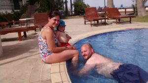 Zoe, Rich & Arthur at the deserted poolside of Almyrida Beach Hotel
