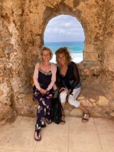 Posing in an archway in the harbour wall leading to Chania lighthouse